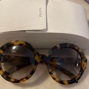 Prada round sunglasses in case with cloth
